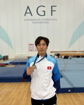 石偉雄是中國香港男子競技體操運動員