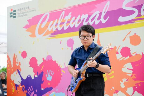 Electronic guitar performance by a local student