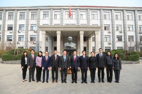 The EdUHK delegation, together with CFAU senior management and staff in front of the statue of Chen Yi   