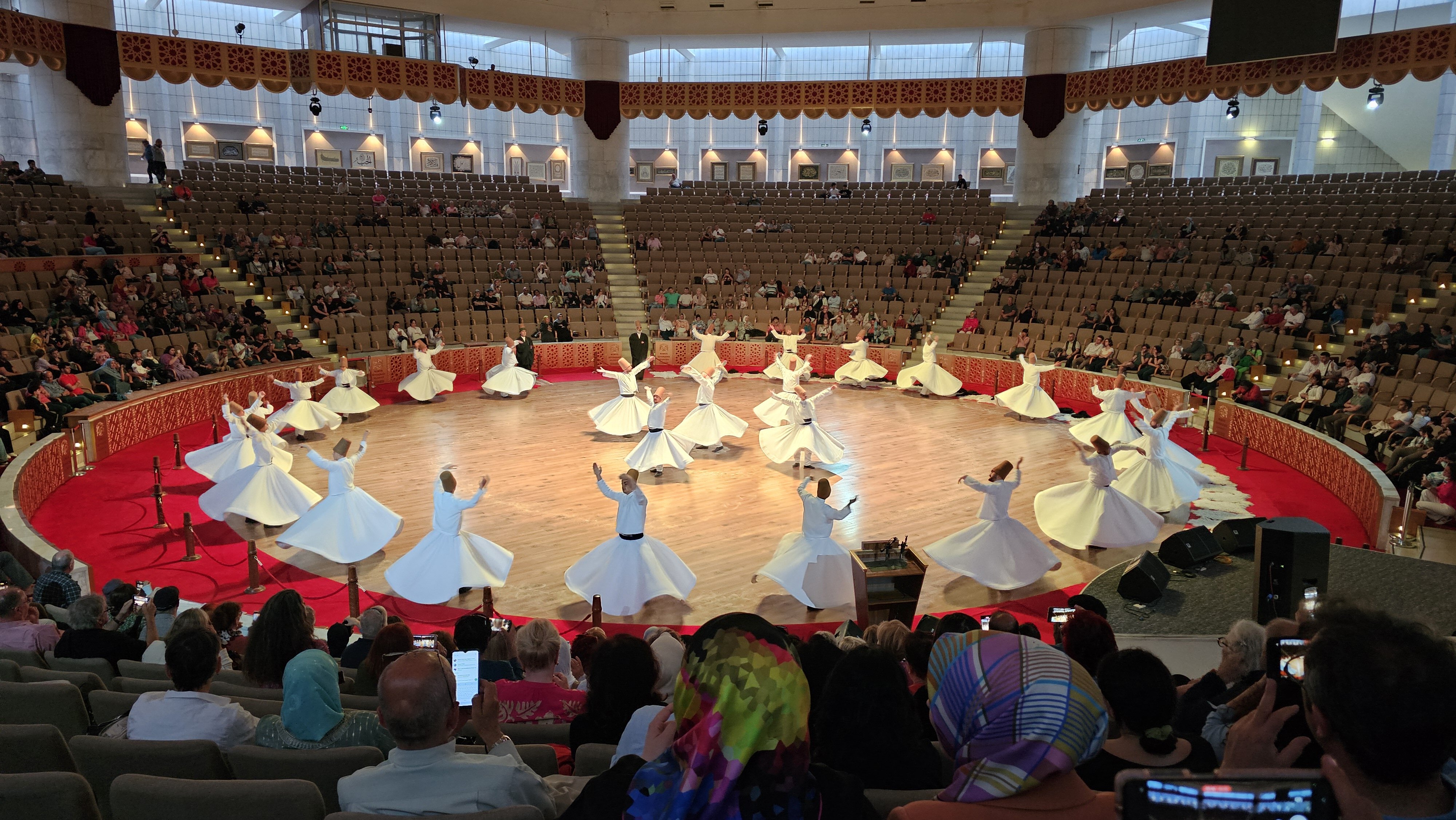 The team witnesses the spiritual Dervish performance in the city of Rumi